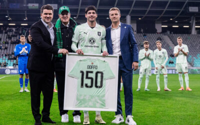 Kapetan Doffo s pogledom na velik mejnik